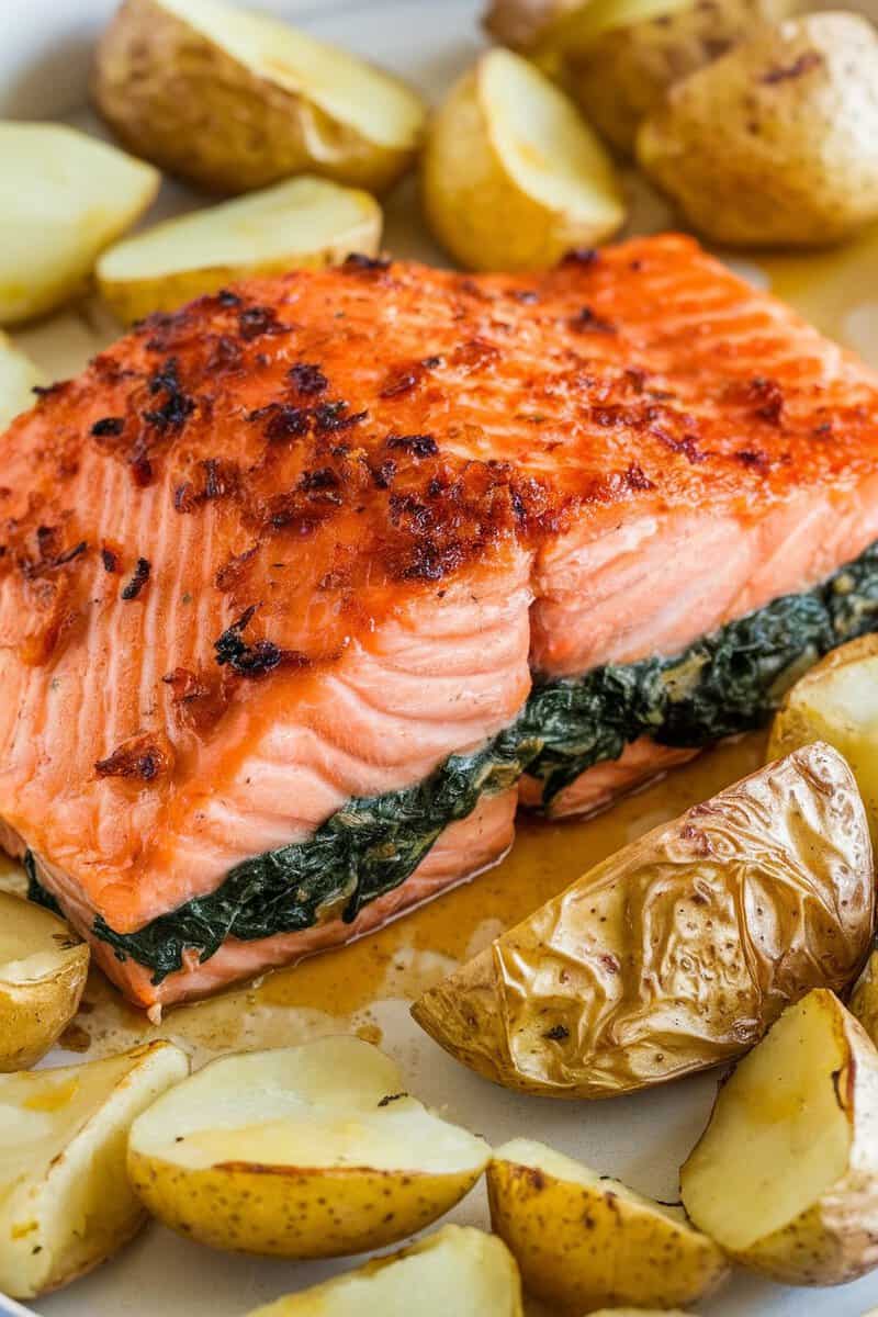 Honey mustard spinach stuffed salmon with roasted potatoes